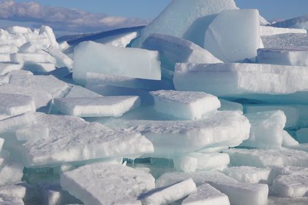Photographers and locals are witnessing what's called "blue ice" near Lake Michigan.