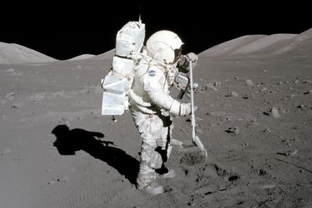 Harrison Schmitt, Apollo 17 astronaut and geologist, collecting samples of lunar soil in 1972. Along with Eugene Cernan, Schmitt collected about 245 pounds of material for return to Earth.