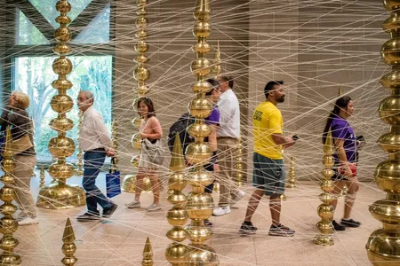 The installation Terminal allows visitors to walk through the work, between the spires and beneath the canopy that connects them.