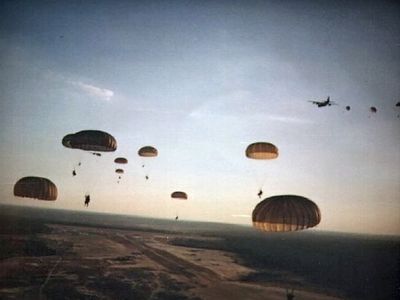 U.S. paratroopers drop into Grenada