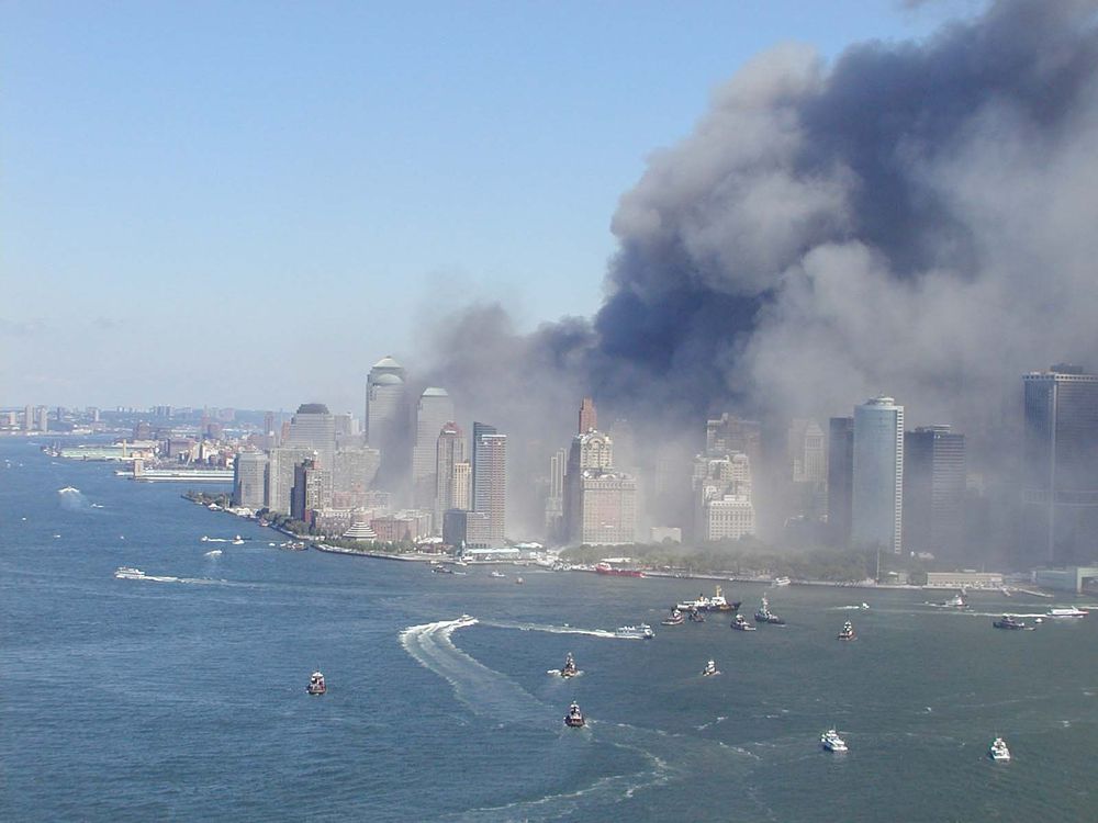 view of Manhattan with smoke cloud from the water