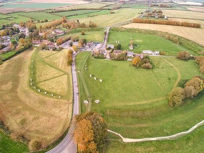 Avebury stands some 25 miles north of Stonehenge and is large enough to fit two Stonehenge-sized circles. 