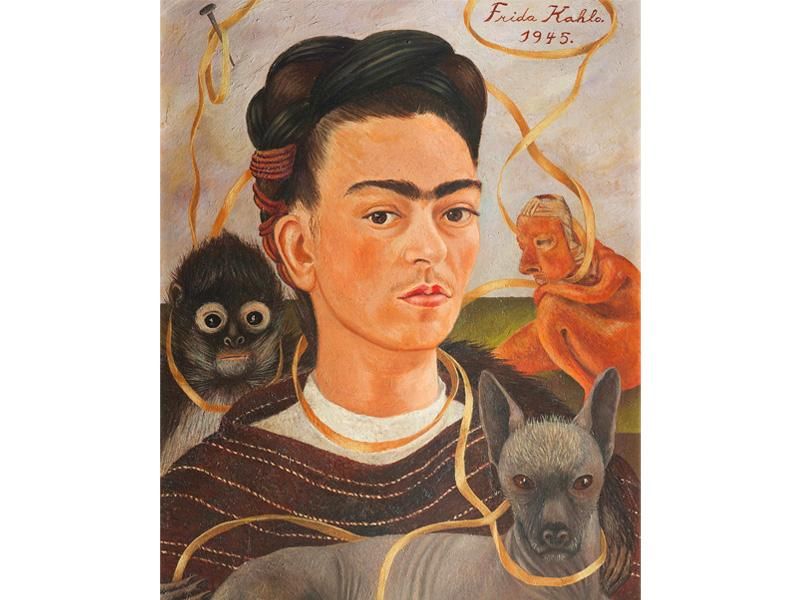Kahlo makes eye contact with the viewer in this portrait of her head; she is encircled by a golden ribbon, a gray dog, a monkey and a folk art-inspired statue behind her shoulder