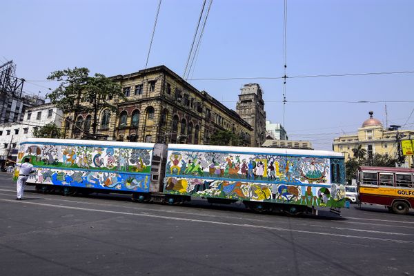The colorful tram car in the city street. thumbnail