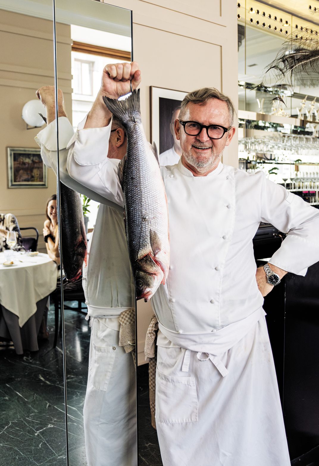 At JB Restavracija, Janez Bratovž with an Adriatic fish destined for dinner. He serves the fish with saffron and pumpkin.