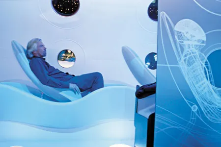 Richard Branson, shown here in a replica spaceship, wants to place CO2-intensive activities above Earth.