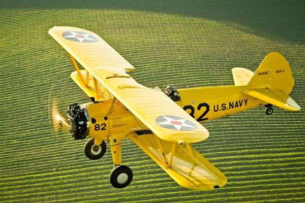 Pilot John Reed takes in the scenery over Wine Country in his 1950 Boeing Stearman. thumbnail