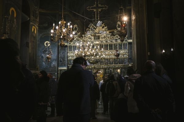 A Quiet Prayer in an Eastern Orthodox Church Interior thumbnail