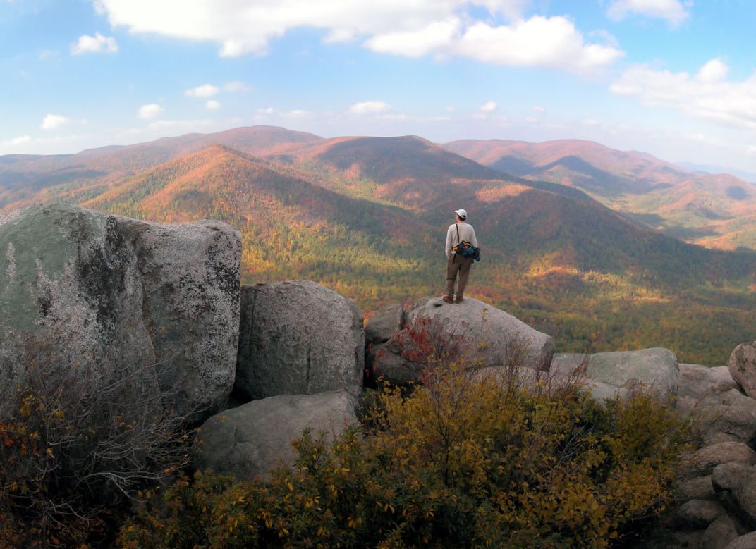 Person standing on rock at Shenandoah National Park