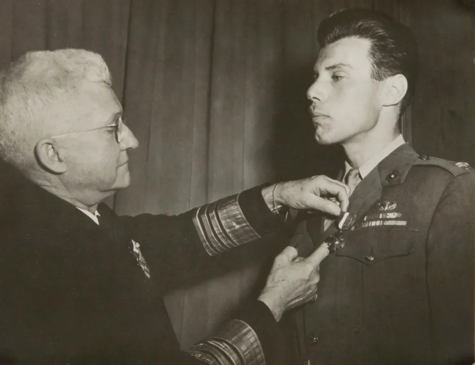 Ortiz receives the first of the two Navy Crosses he was awarded for extraordinary heroism during World War II.