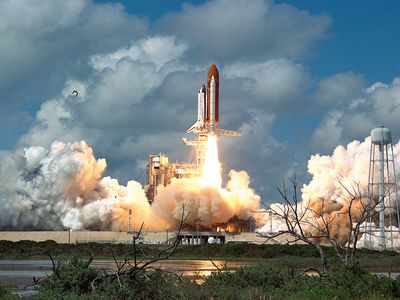Space shuttle Discovery blasts off for orbit on September 29, 1988—almost three years after the Challenger accident—with a system that would, for the first time, enable the crew of five astronauts to escape the orbiter in case of emergency during ascent.