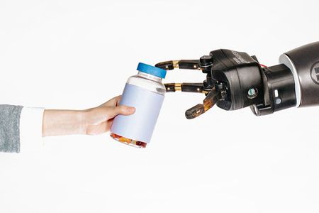 A robot and human interacting.