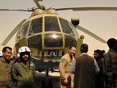 At Kandahar airfield, Afghans and Western coalition members celebrate the activation of the Afghan air force’s second wing.