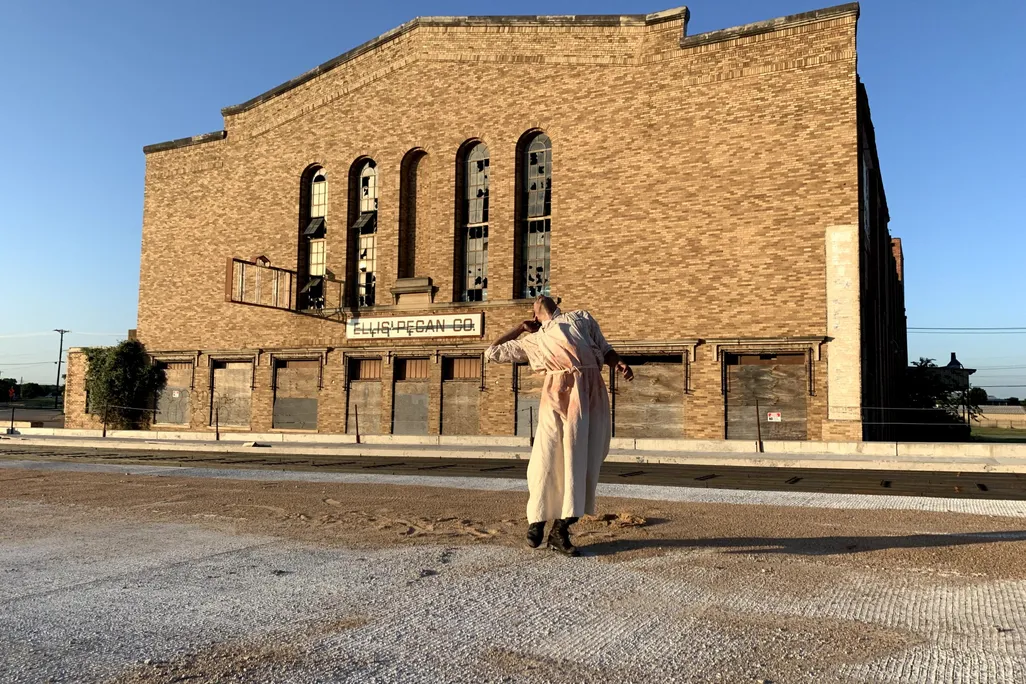 Dancer in front of building