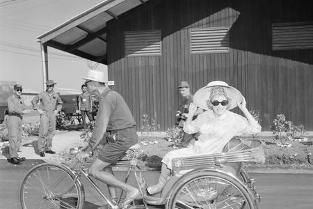 Phyllis Diller arrives at Korat Air Base, Thailand, with the Bob Hope Christmas show, 1966.