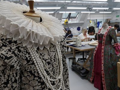 A worker sews a costume at the Royal Shakespeare Theatre in 2021 in Stratford-upon-Avon, England.