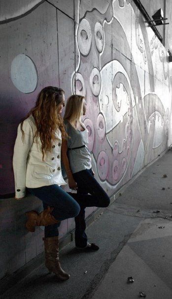 Girls Along graffiti-ed wall in New Jersey thumbnail