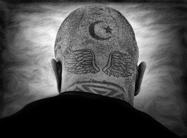 A tattoo on the back of a head in Bosnia Herzegovina. thumbnail