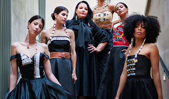 Norma Baker–Flying Horse (third from left) with models wearing her Red Berry Woman designs. Paris Fashion Week, March 2019. (Ulla Couture Photography)