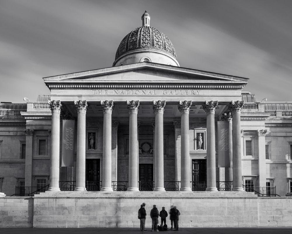 Organizers stand in front of The National Gallery in London, England. The gallery is situated in Trafalgar Square in the City of Westminster and was founded in 1824.