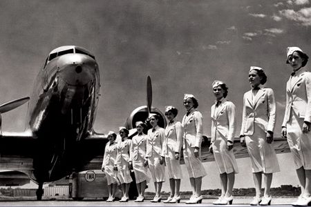 In 1938, TWA stewardesses were honored for each having completed a quarter-million miles or more of flying.
