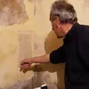 An Artist Noticed a Leak in His Studio. The Repairs Revealed a Mysterious Ancient Engraving Hidden Inside the Walls icon