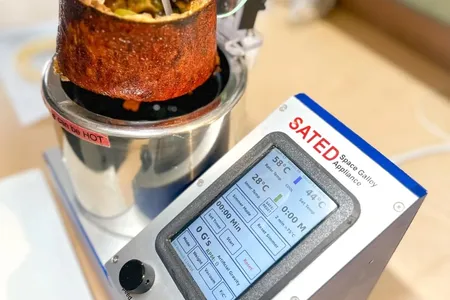 SATED can cook a perfectly crisp pizza in a low- to no-gravity environment.