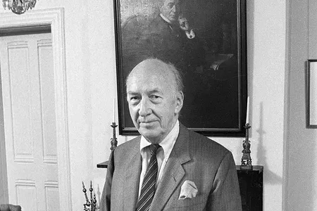 Smithsonian Secretary S. Dillon Ripley, in 1978, stands before a portrait of a predecessor—Joseph Henry, the first Secretary. 