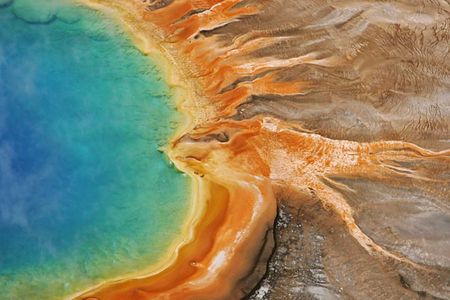 Geologic processes have led to changes in the water and gases released by mudpots, geysers and springs&mdash;like this one.