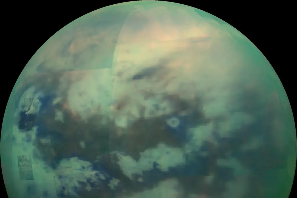 An image of Titan taken by the Cassini rover, which shows the darker dunes on the moon's equatorial surface.