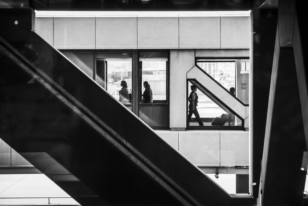 I captured this photo at Phoenix Sky Harbor Airport while returning from Hawaii. Sitting in a restaurant, I found it interesting how I could look out the window in front of me to see an endless flow of travelers, each with a suitcase and an untold story. Watching them, I couldn’t help but wonder about their destinations and origins, the fleeting intersections of so many lives. I find it beautiful that you can represent little stories and thoughts such as these in photography.