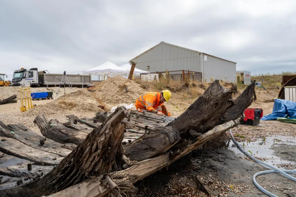 Archaeologist studies remains of ship