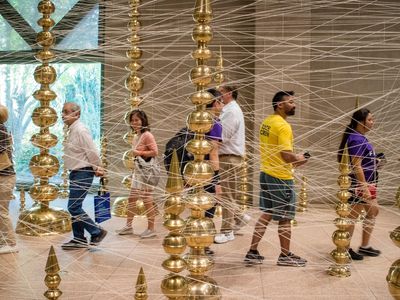 The installation Terminal allows visitors to walk through the work, between the spires and beneath the canopy that connects them.
