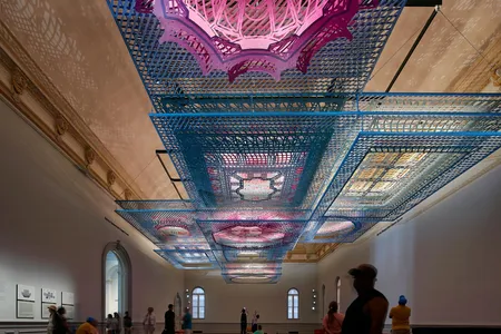 Viewers are invited to sprawl on the carpeted floor and look up.