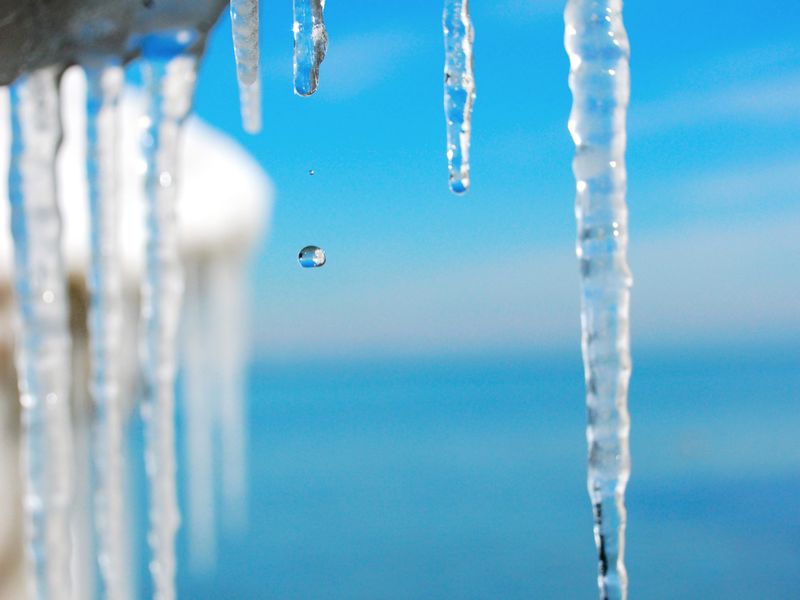 The ice melts quickly on this minature glaciers in Lake Michigan as the