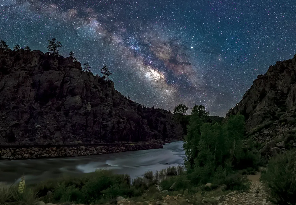 Milky Way visible over river