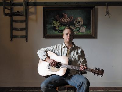 Daniel Bachman at home in Madison County, Virginia, with his trusty Martin D-18 guitar.