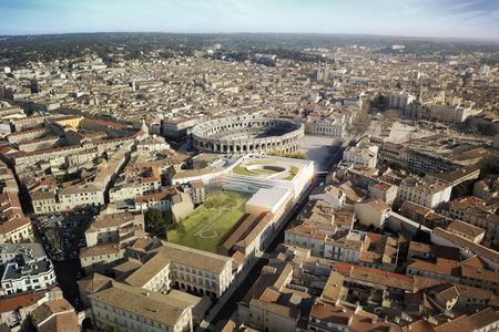 An aerial photograph shows the new museum’s proximity to the ancient arena.