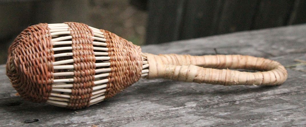 Closeup on a woven grass rattle.