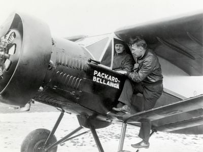 Walter E. Lees (in cabin) had almost 20 years of experience in the cockpit and had been trained by Glenn Curtiss himself. Frederic A. Brossy, his copilot, was less seasoned, but had an easygoing temperament that would help the two men survive their long and stressful confinement together.