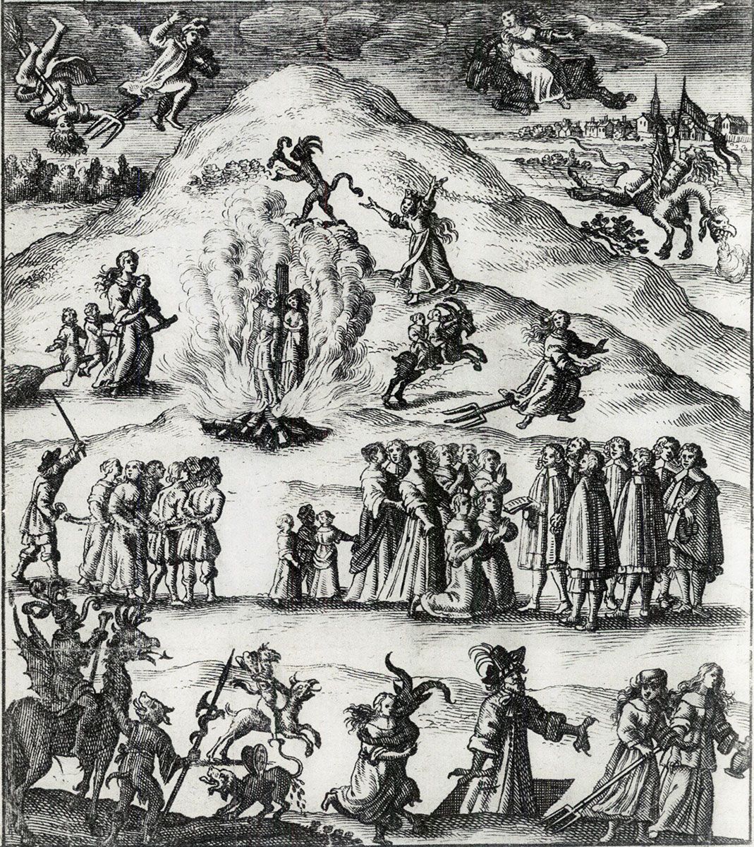 Ink illustration of a scene of chaos: two people burning at the stake, groups of women bound in handcuffs and ordered around by men, small devilish characters with horns, and women flying on pitchforks.