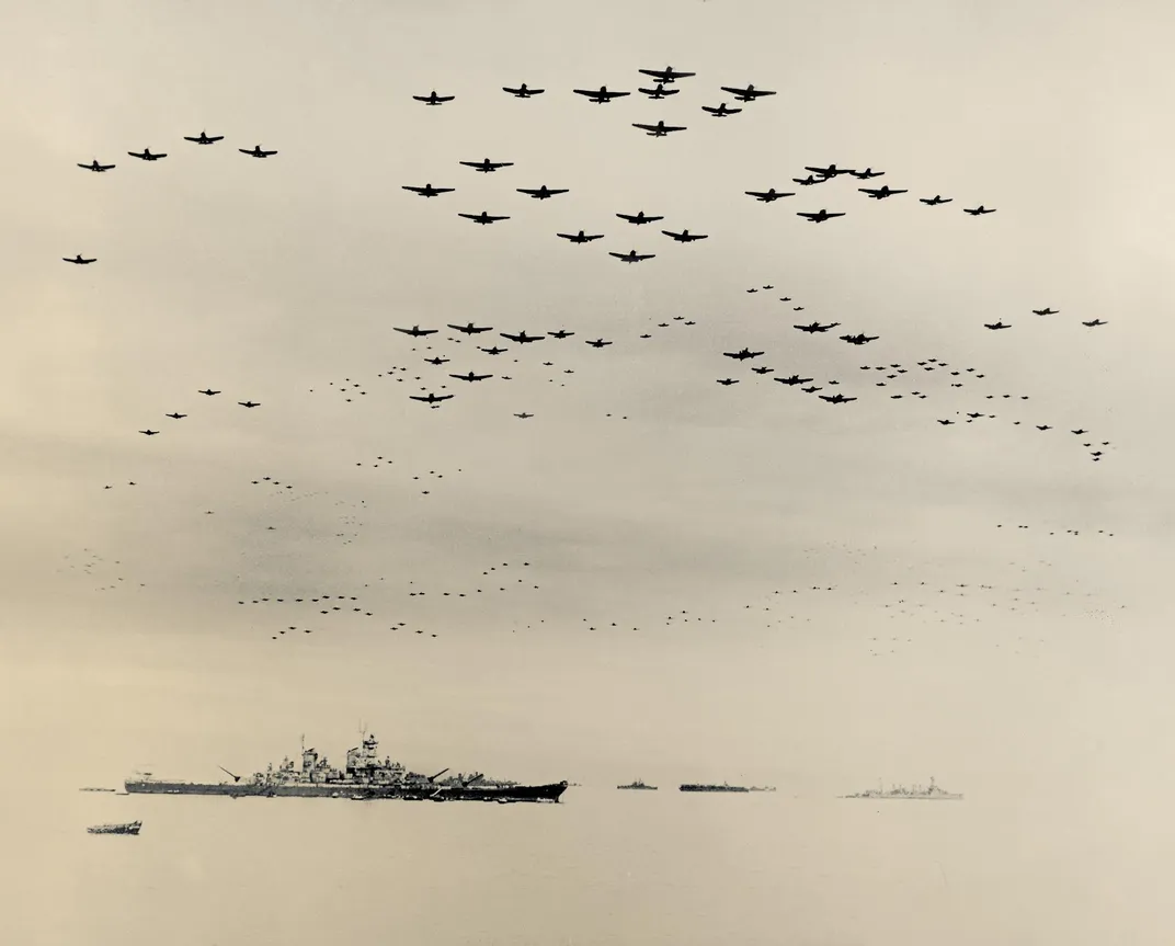 U.S. Navy carrier aircraft fly over Tokyo Bay