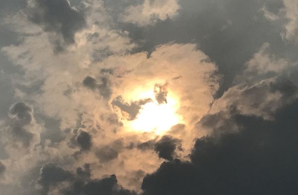 The sun breaks through smoke from the Canadian fires. thumbnail