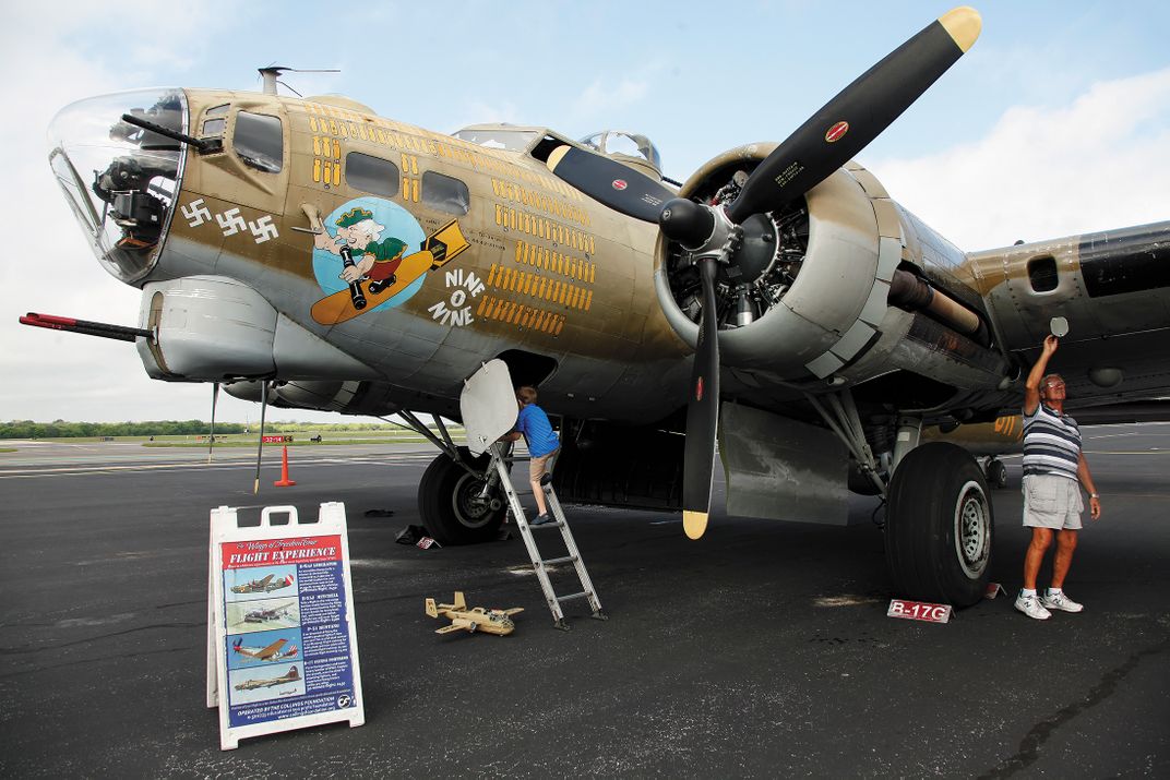 A young visitor enjoys his first look at a B-17.