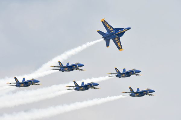 This a closeup of Blue Angels diamond formation split up. thumbnail
