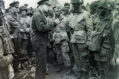Meeting troops at Greenham Common Airfield in England on the eve of D-Day, Eisenhower kept the conversation light. They talked about face paint (a mix of cocoa and cottonseed oil), civilian life, and fishing in Saginaw, Michigan.