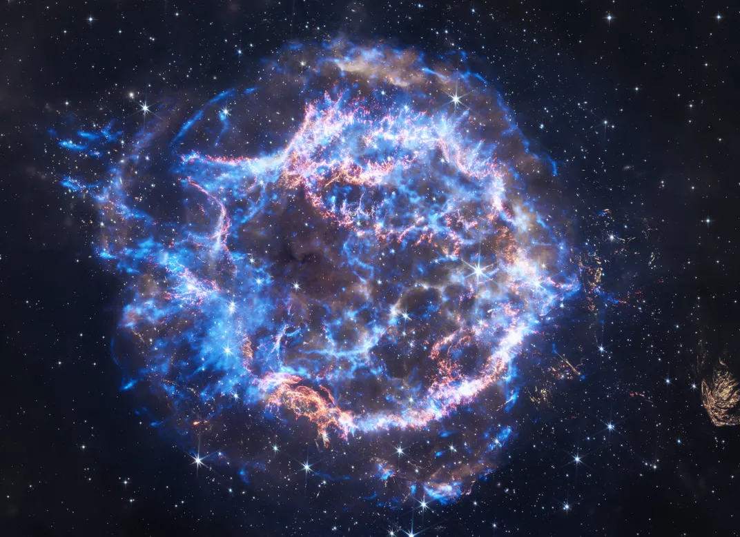 bright blue and purple filaments in space forming an orb