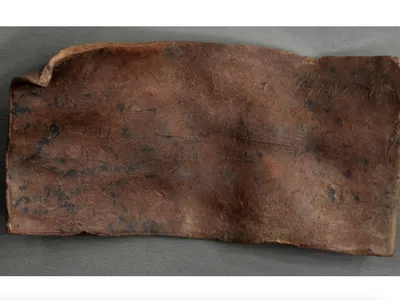 This Magical Curse Written in Greek on a Small Lead Tablet Was Meant to Punish Enemies Nearly 2,000 Years Ago image