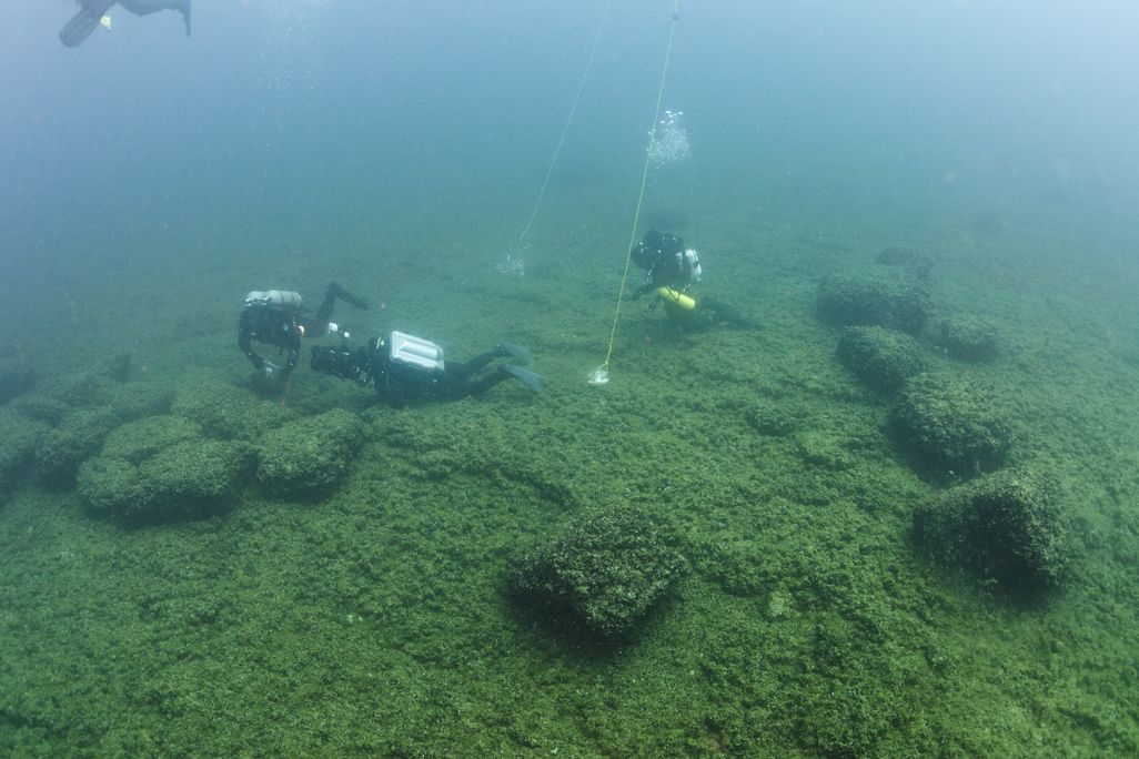 Archaeologists collect samples from a caribou hunting site on Alpena-Amberley Ridge in Lake Huron.