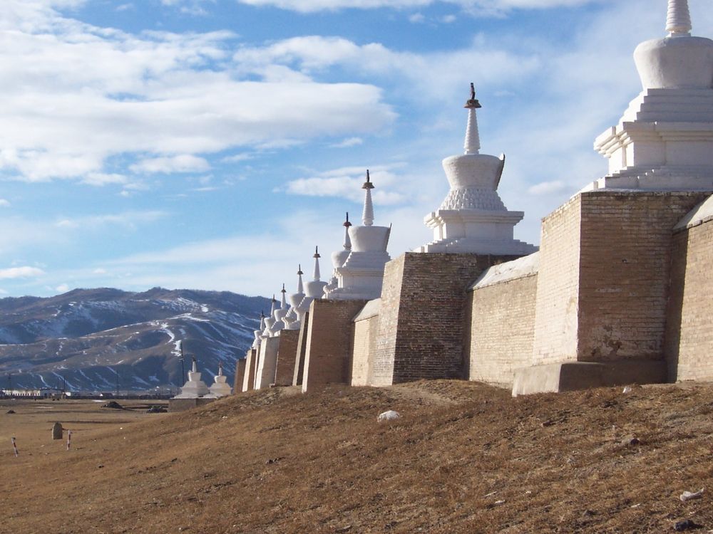 A view of the Orkhon River valley under a blue sky